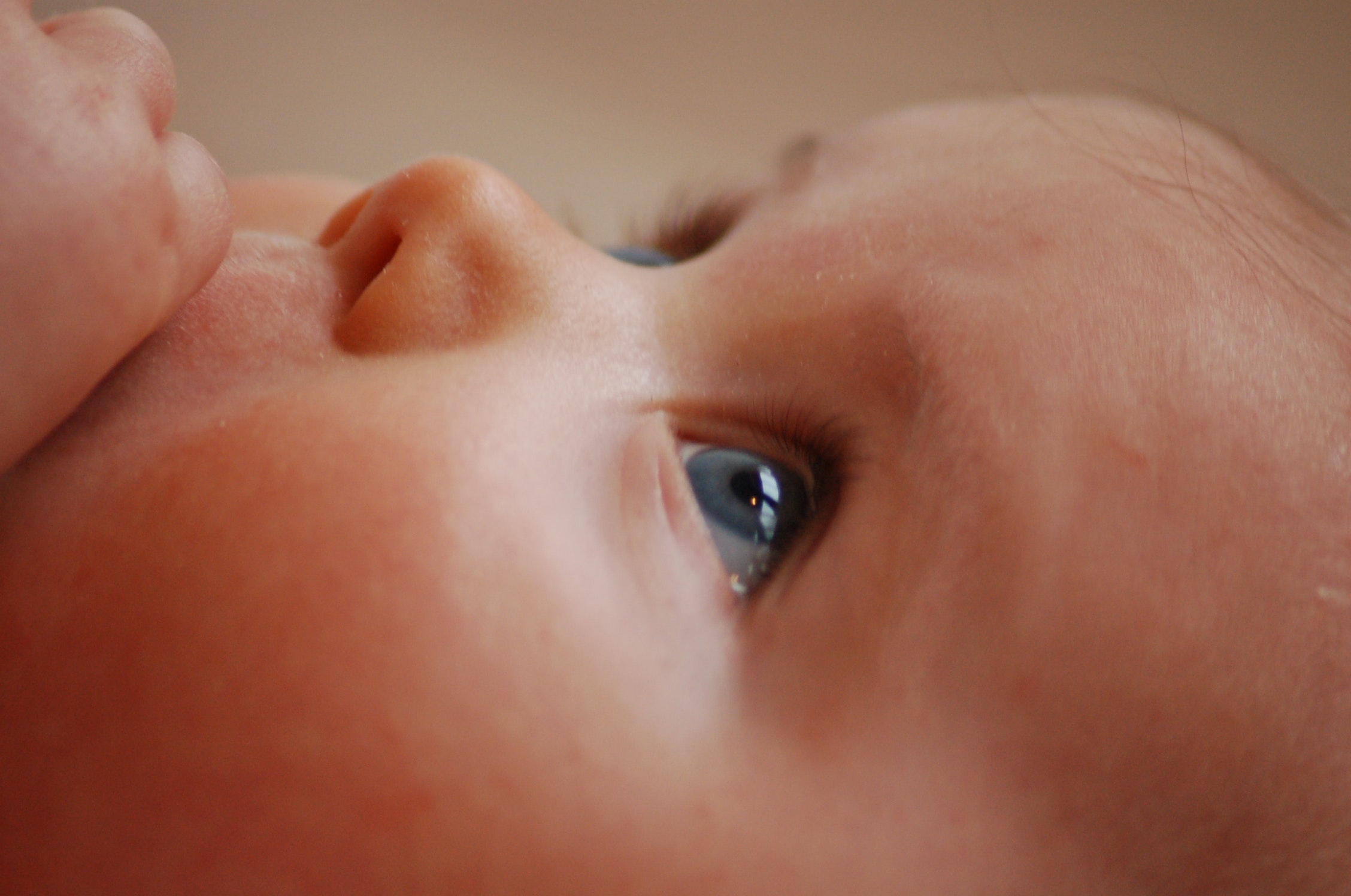 A close up photo of a baby's face