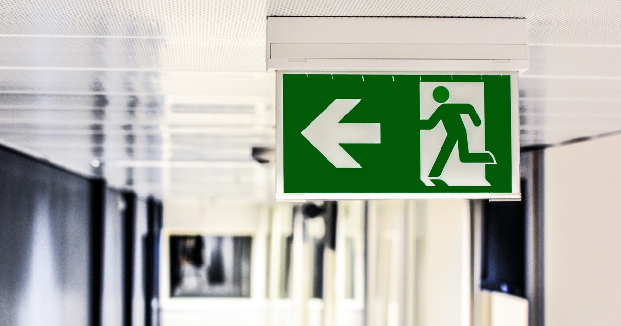 A photo of an emergency exit sign