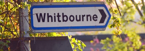 signpost saying 'Whitbourne'