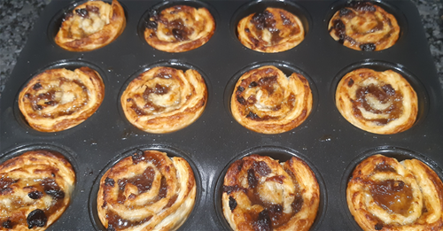 12 mincemeat swirls baked in a muffin tray